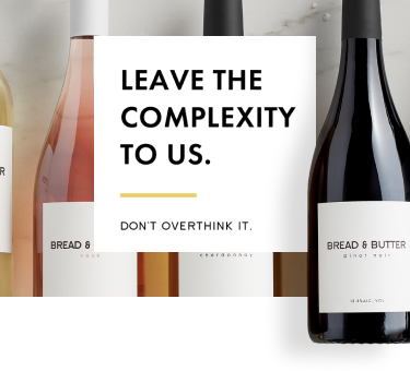 Bread & Butter home page hero with Bread & Butter Chardonnay on a marble background with copy that says, "Leave the complexity to us. Don't Overthink It."