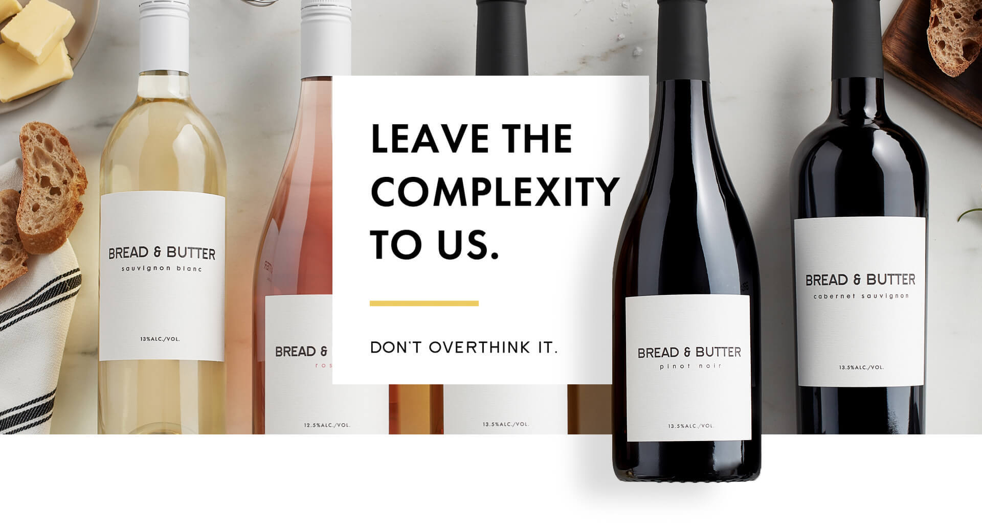 Bread & Butter home page hero with Bread & Butter Chardonnay on a marble background with copy that says, "Leave the complexity to us. Don't Overthink It."