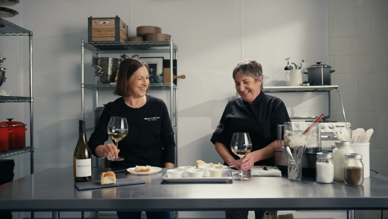 Winemaker Linda Trotta and Chef & Buttermonger, Sheana Davis in a test kitchen making compound butter to pair with Bread & Butter Chardonnay.