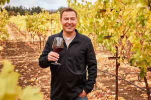 Winemaker Matt Shuplock in an autumn vineyard