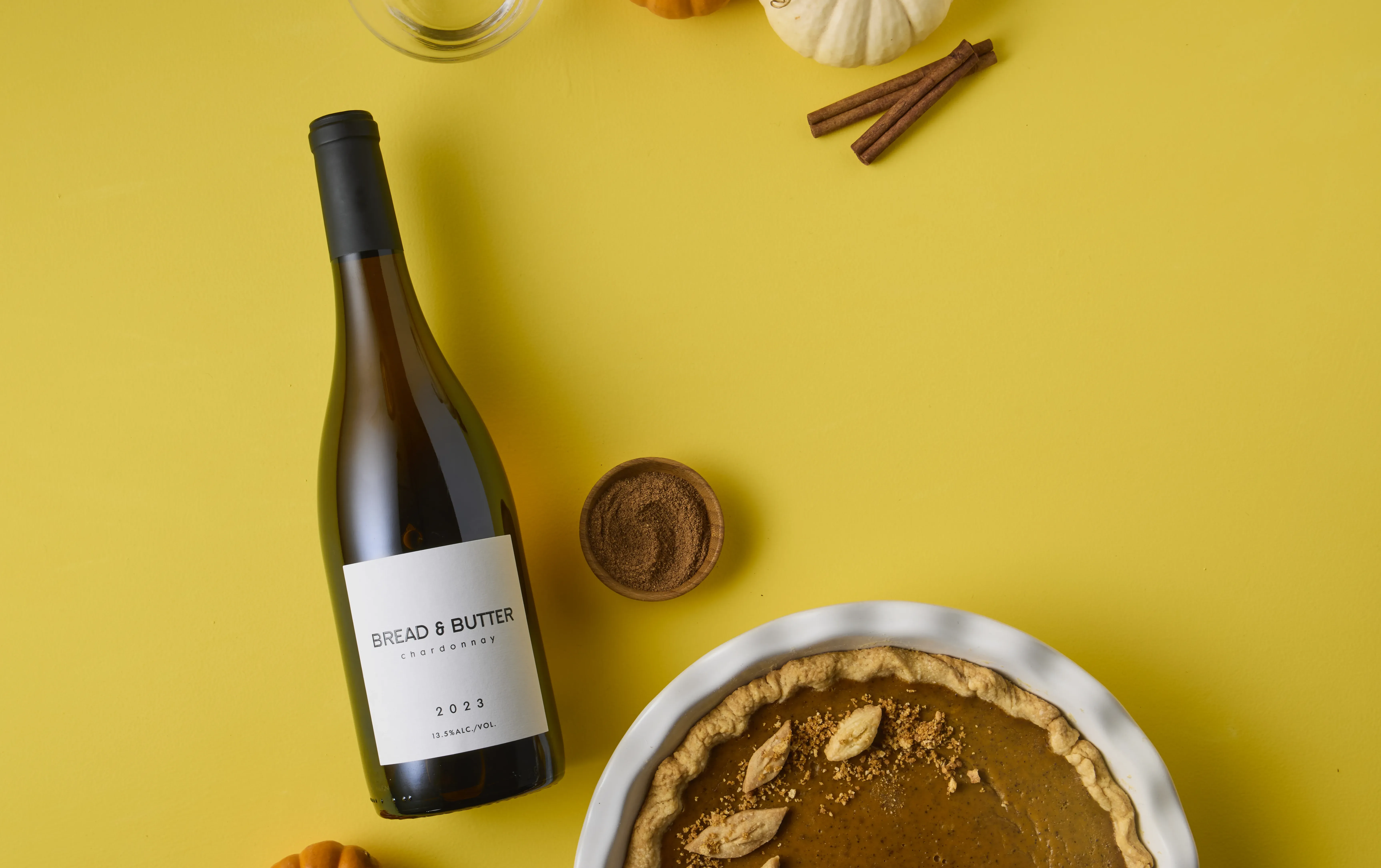 Chardonnay surrounded by pumpkins and pies